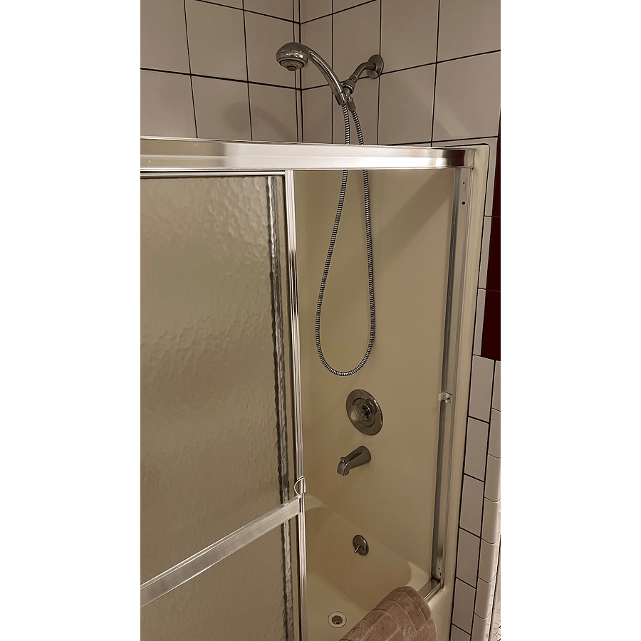 Shower accommodates very tall people! Tub is normal size. Water pressure is strong, and the tank is 50 gallons - plenty. 