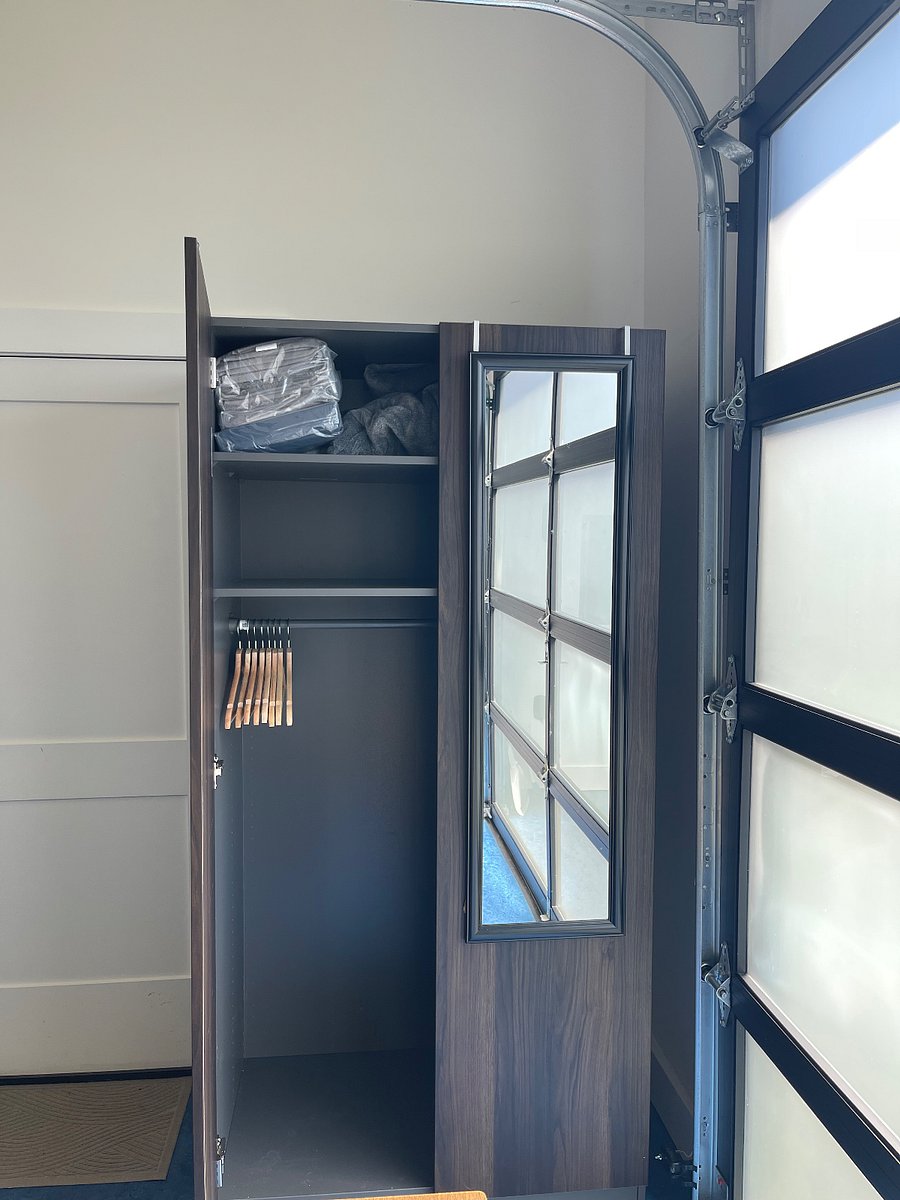 Armoire with iron & ironing board