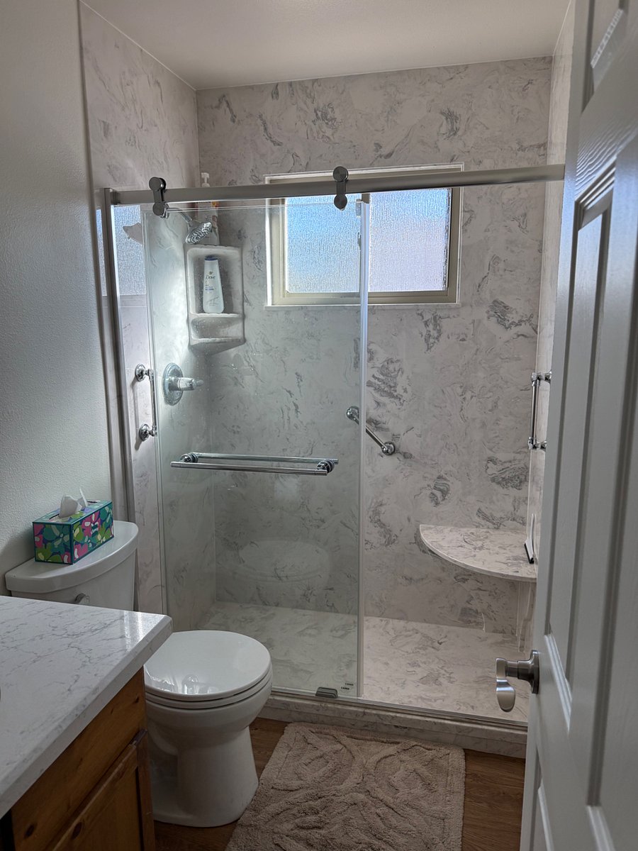 walk in shower, toilet, sink