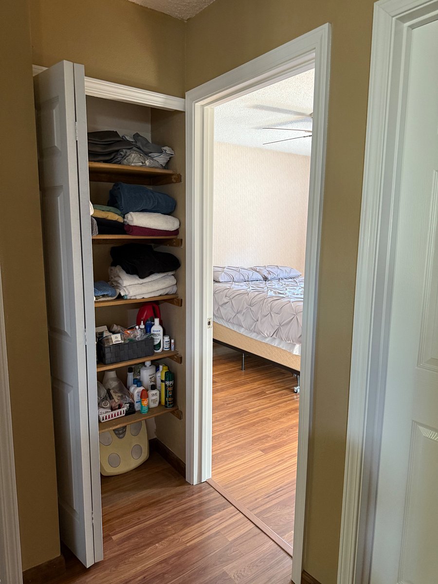 Linen closet next to bedroom