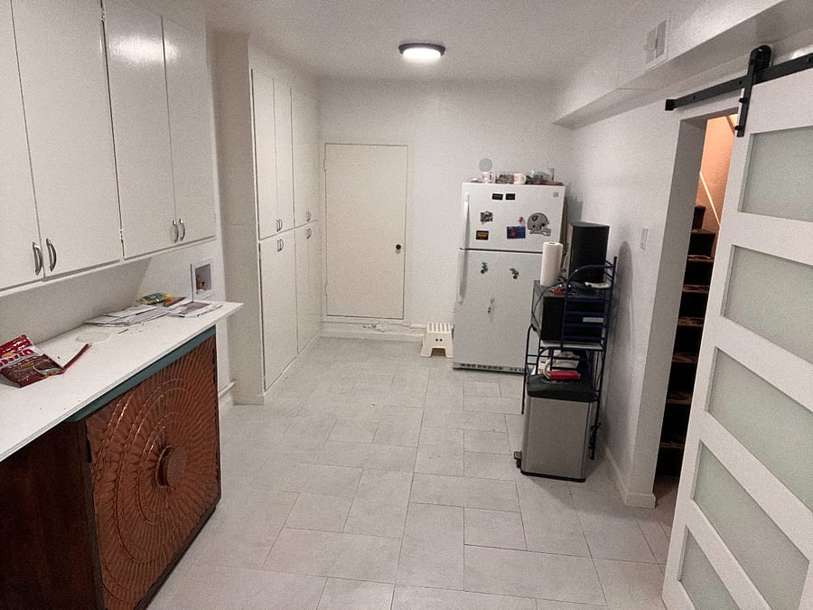 view of kitchenette (in progress) from Ground Level Unit entry door. 