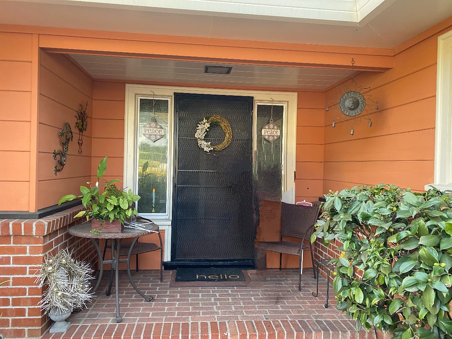 covered porch, always shaded. 
screened security gate.