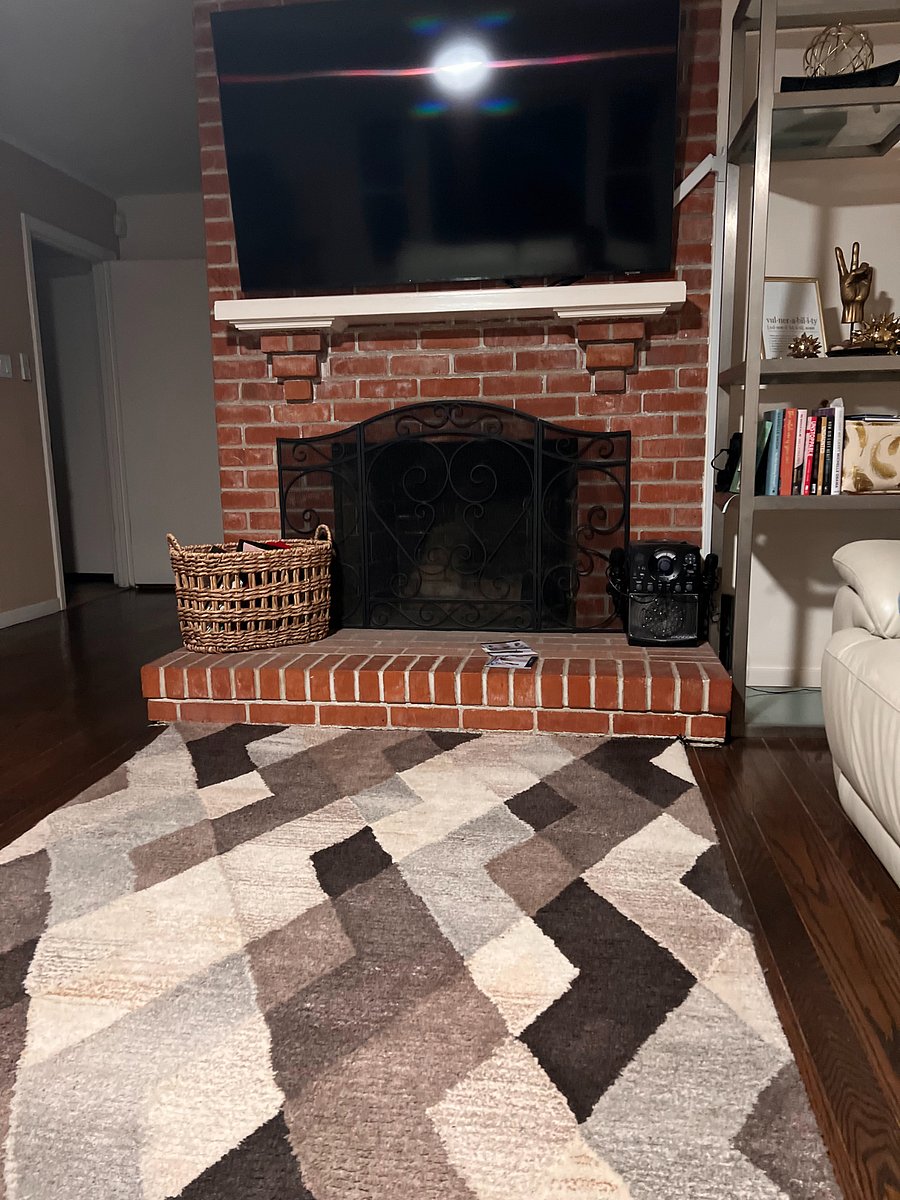 living room, fireplace use is not permitted.