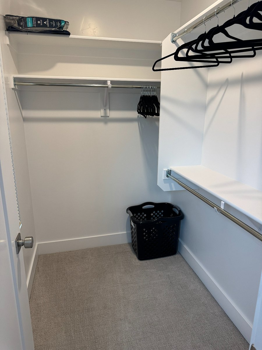 Primary bedroom walk-in-closet