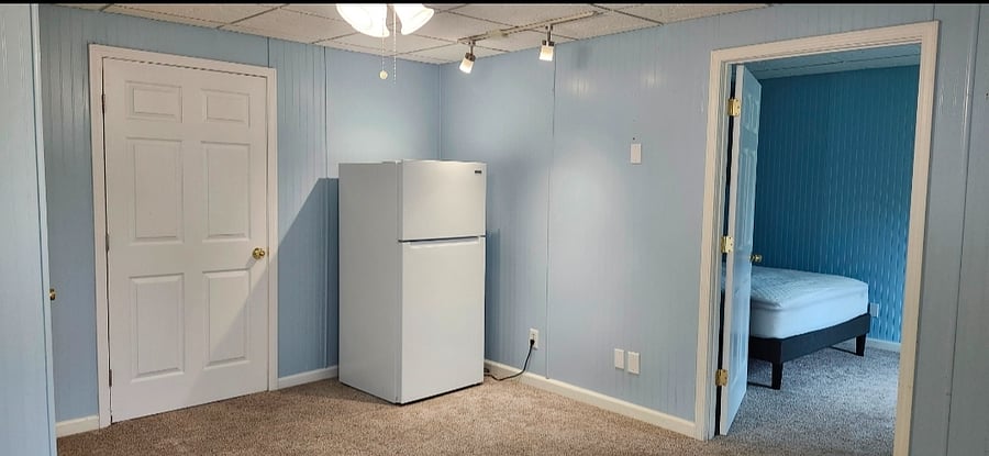 Front room includes a Refrigerator & Microwave
