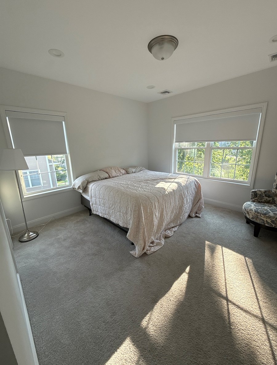 Primary Bedroom: King Bed & Ample Natural Light