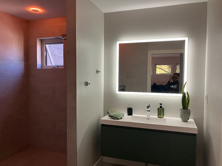 Primary bathroom with soaking tub and rain shower