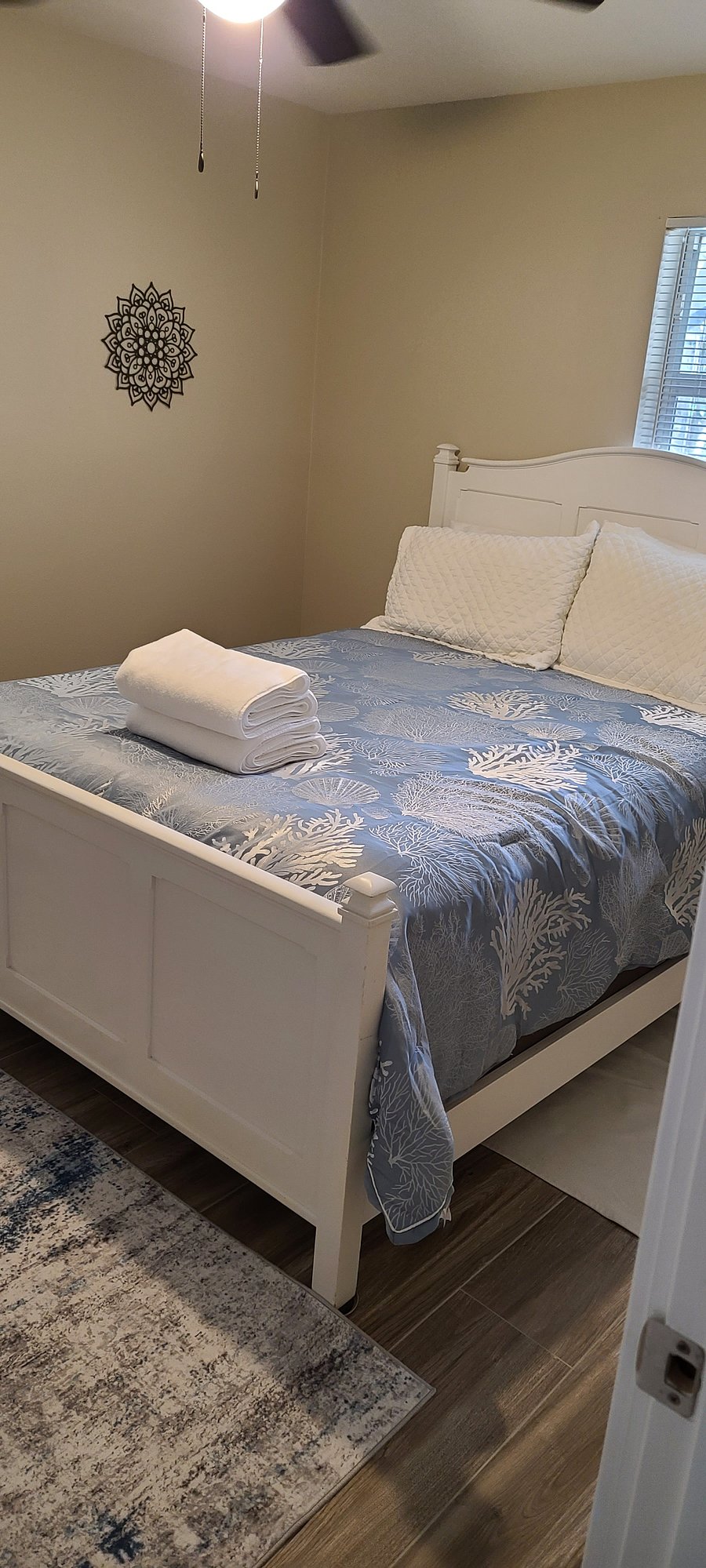 Queen bed in guest room