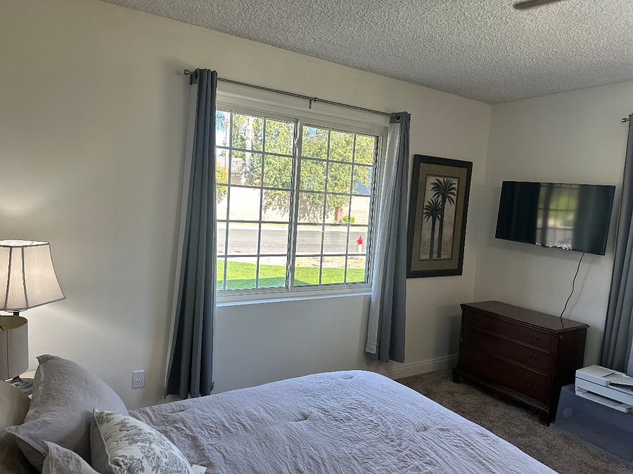 Front bedroom/ office, queen bed,  (2) great windows and a nice desk.