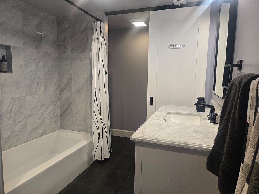 Bathroom with Quartz top sink and vanity.
