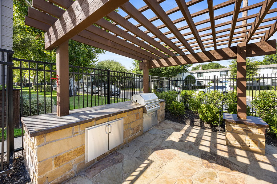 Community grill near pool.