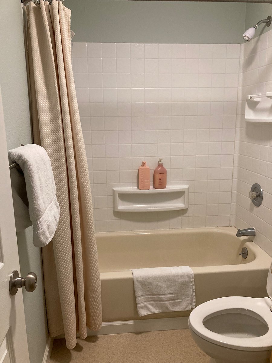 Downstairs full size bathroom next to bedroom #3