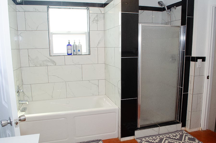 Downstairs bathroom with whirlpool tub and standing shower
