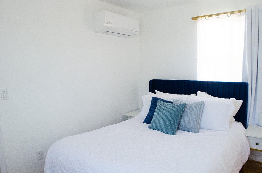 Queen bed in upstairs bedroom