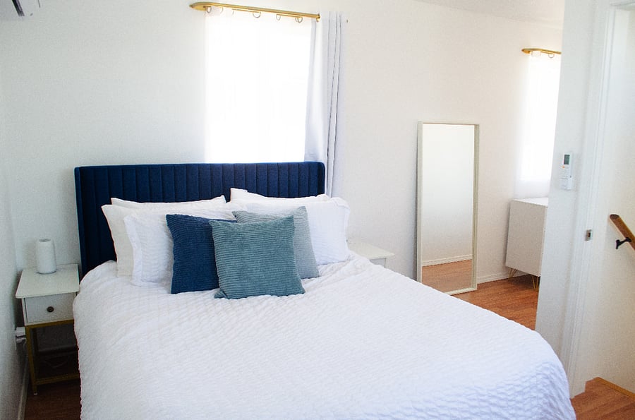 Queen bed in upstairs bedroom