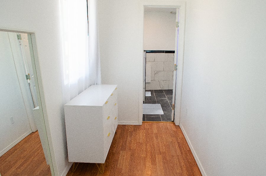 Upstairs bedroom connecting to the full bathroom