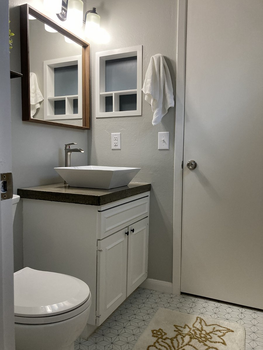 Private bathroom for bedroom #1 Custom built counter and vessel sink