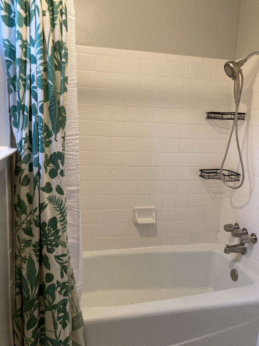 Shower room shared by both bathrooms.