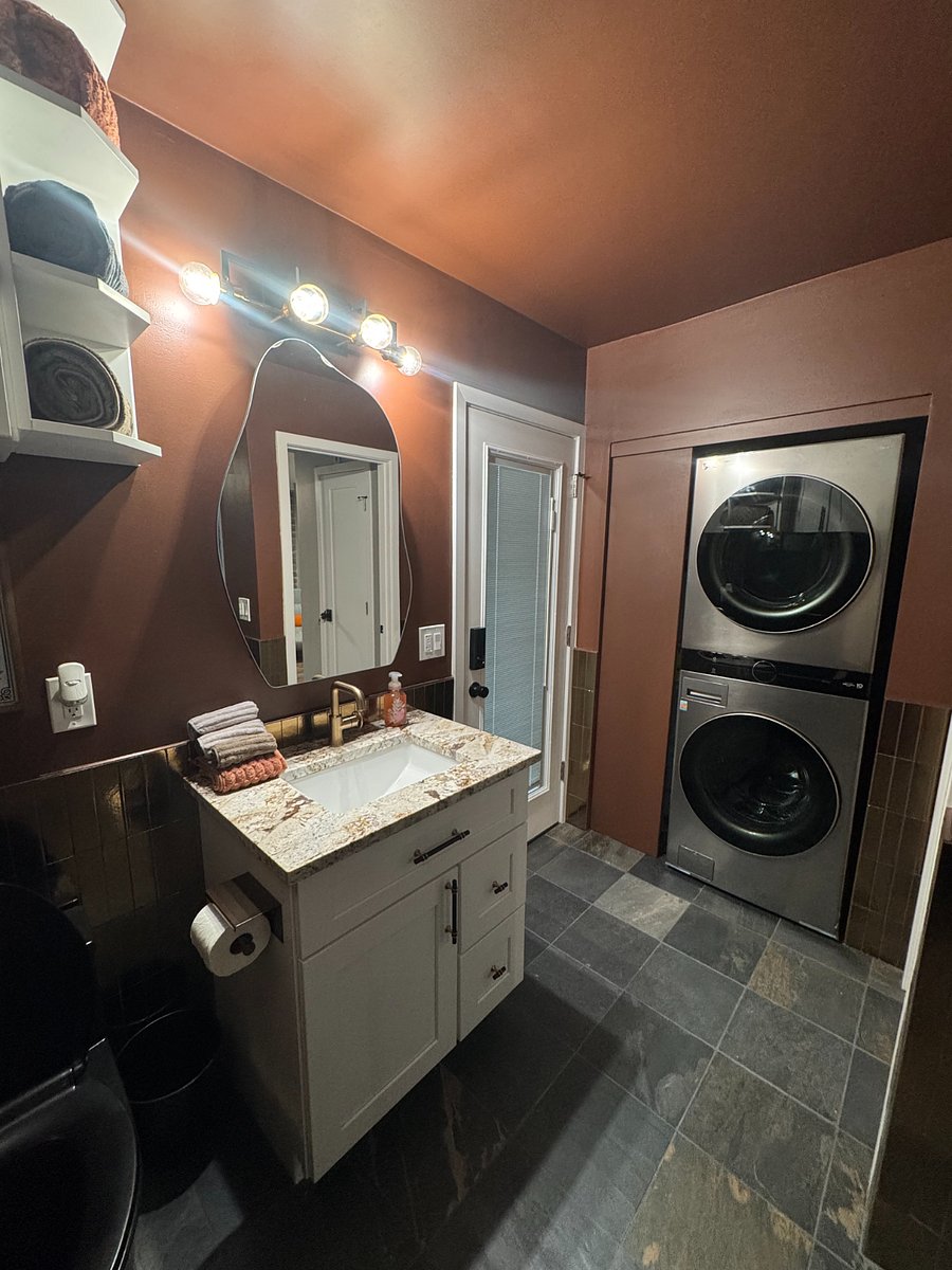 Large Bathroom with stackable washer and dryer