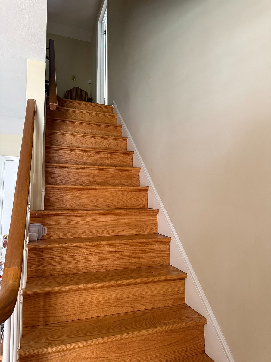 Stairs to room, immediately when you walk in the front door