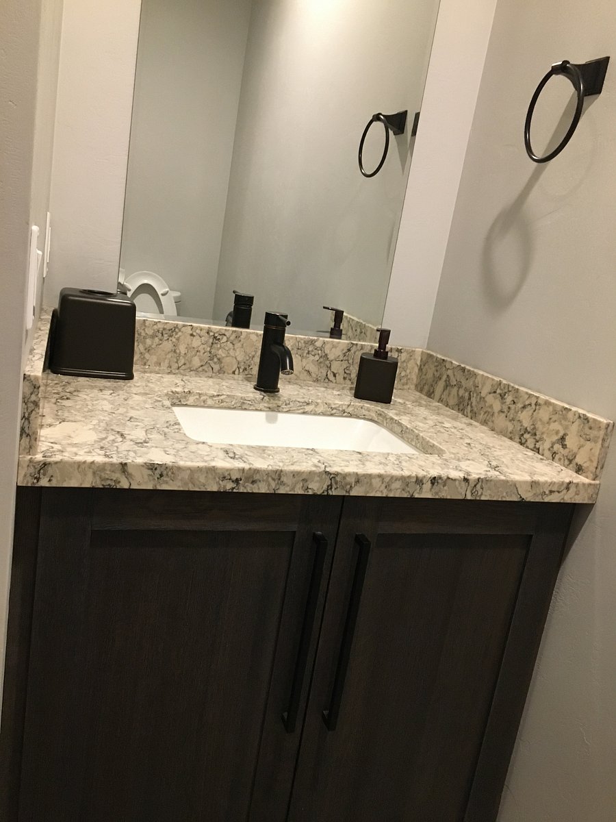 Master bathroom. Quartz countertops.  Thermostat controlled heated floors. Nice for cold winter mornings