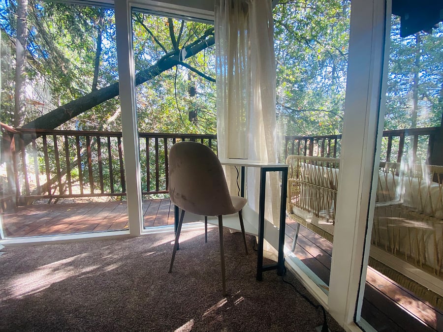 Corner desk with forest view. 