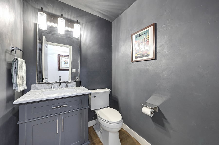 A convenient half bath is located on the main floor.