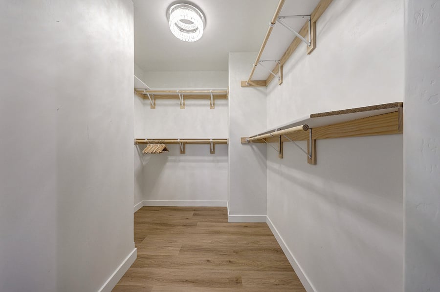 Spacious primary closet.