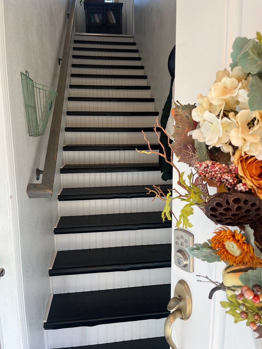 Entrance is up a flight of indoor stairs.