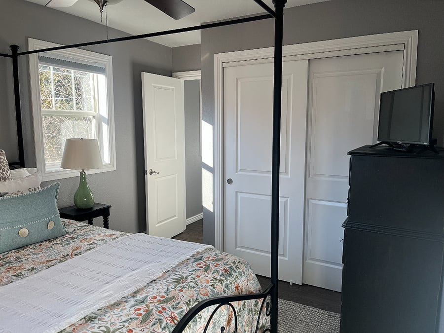 Queen sized canopy bed.
