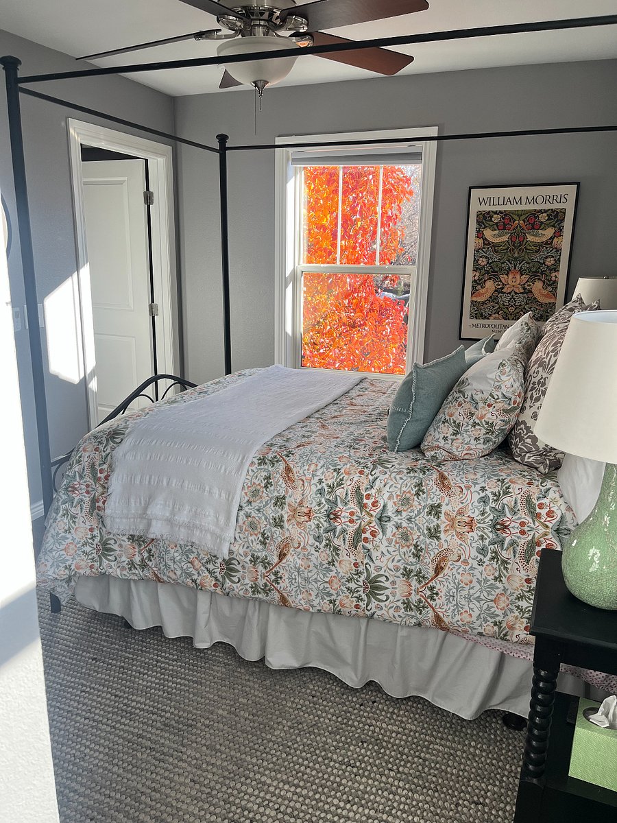 Black out blinds, nice sized closet and smart TV in bedroom.