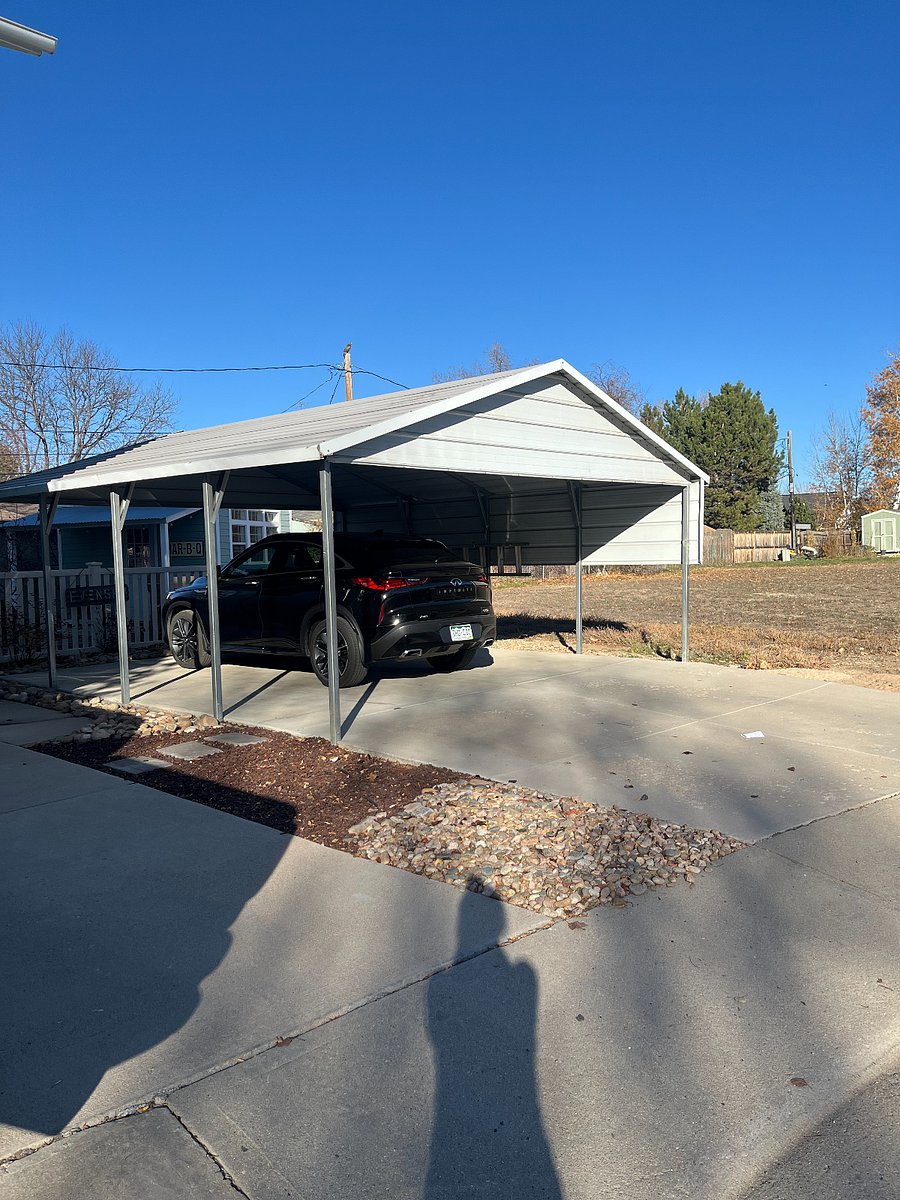 Covered carport is near the front door.