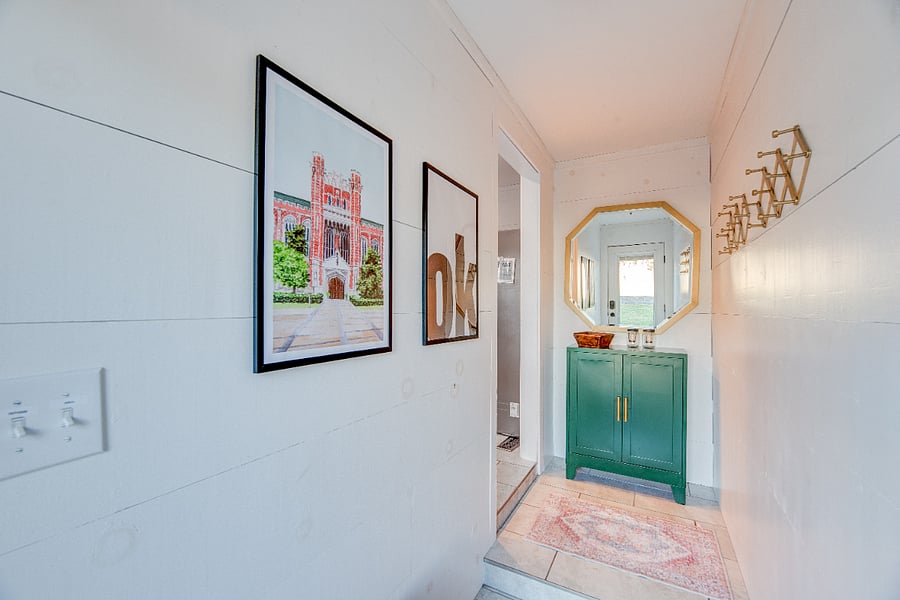 The back hallway features tons of space to hang your purses and jackets. 