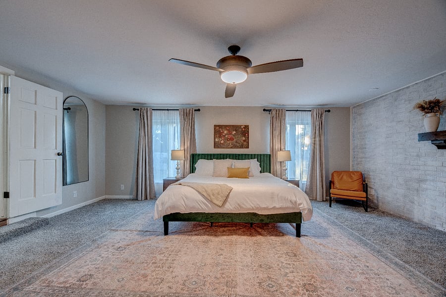 Primary suite on the main floor features a king bed, 50" smart tv, ensuite bathroom, with 100% cotton sheets & towels.