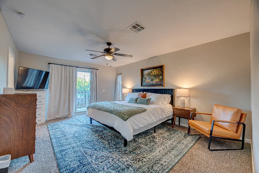 Upstairs primary suite with king bed, 50" smart TV , ensuite bath with walk in shower comfortable and peaceful.
