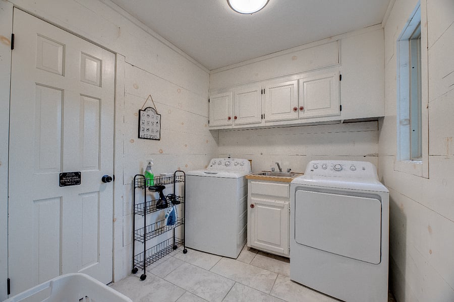 Full-size washer & dryer in-unit on the main floor, We alos provide an iron, built in ironing board, and clothes steamer. 