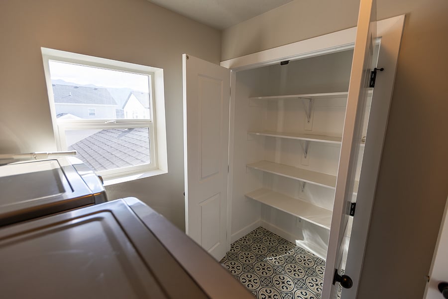 Large washer and dryer complete with a huge storage closet