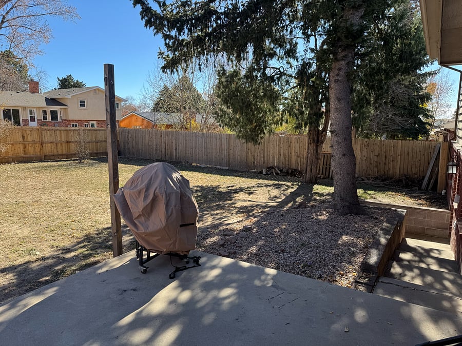 Large fenced/gated backyard