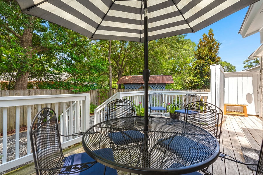 Outdoor seating plus new charcoal Webber grill.