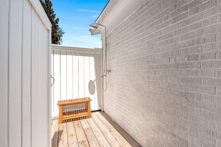 Outdoor shower off the back porch.