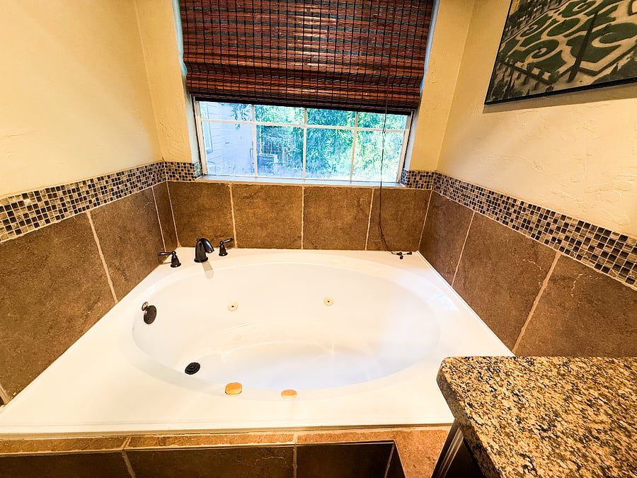 Luxurious jacuzzi tub in Primary Bathroom 