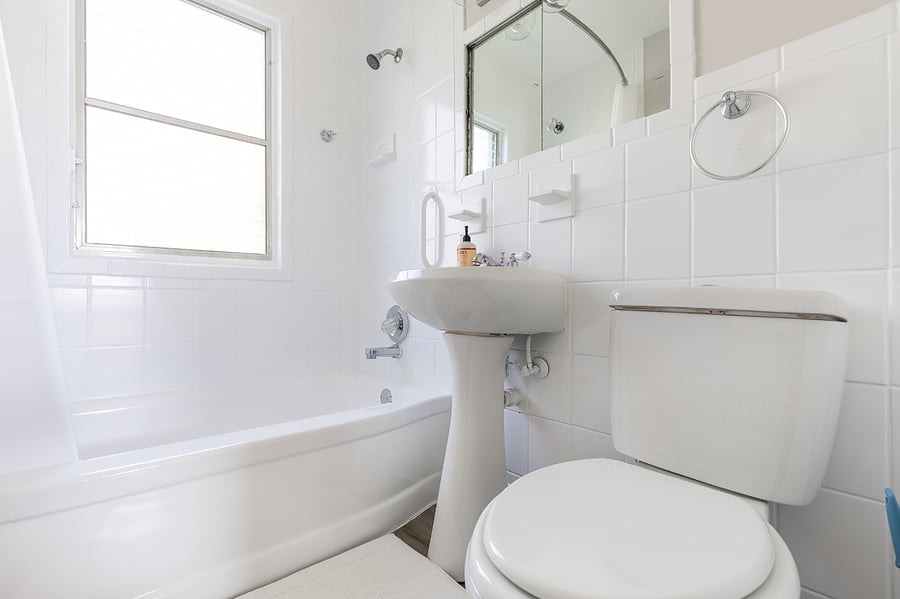 Clean bathroom with tub