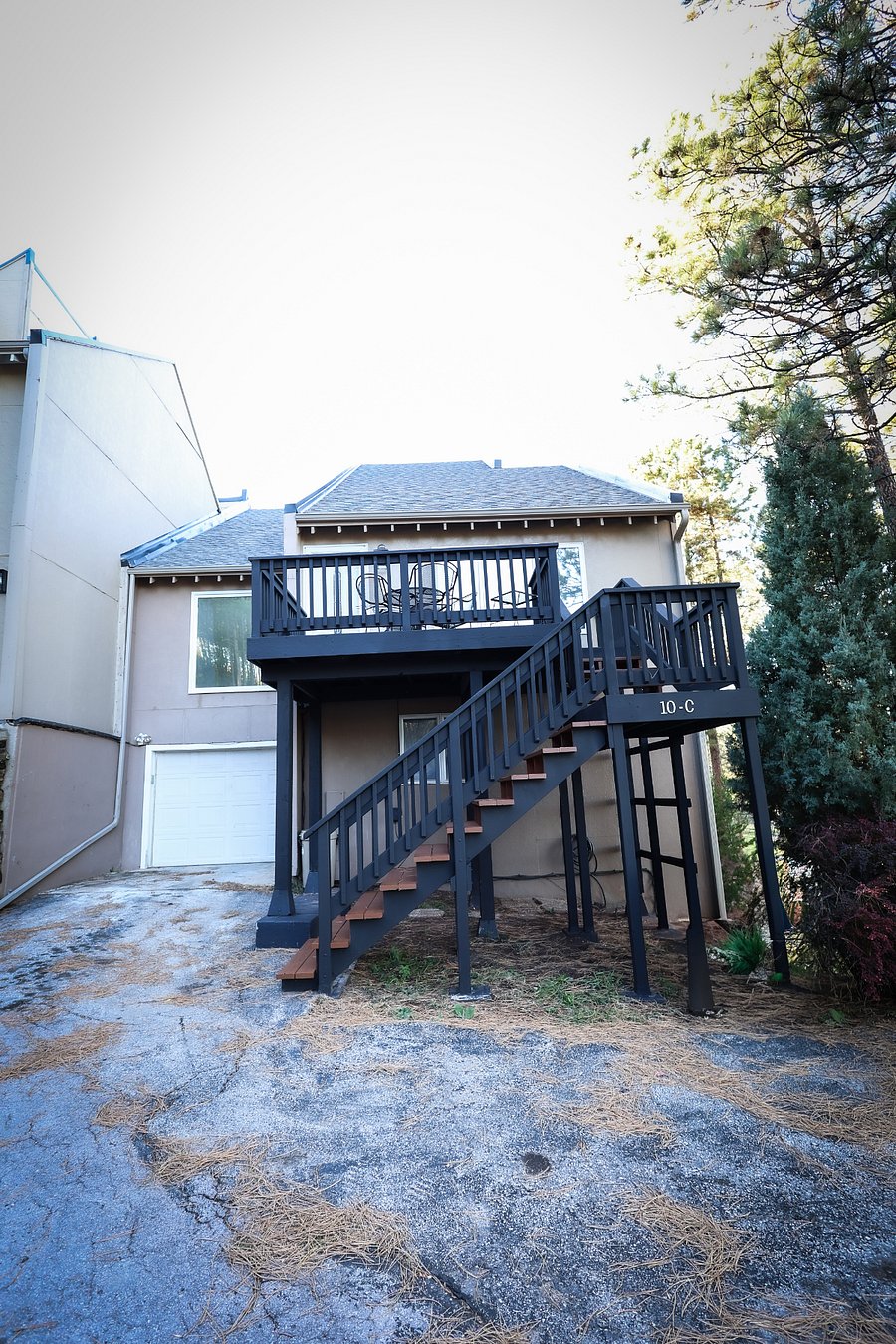 Front of home, ample parking, single car garage