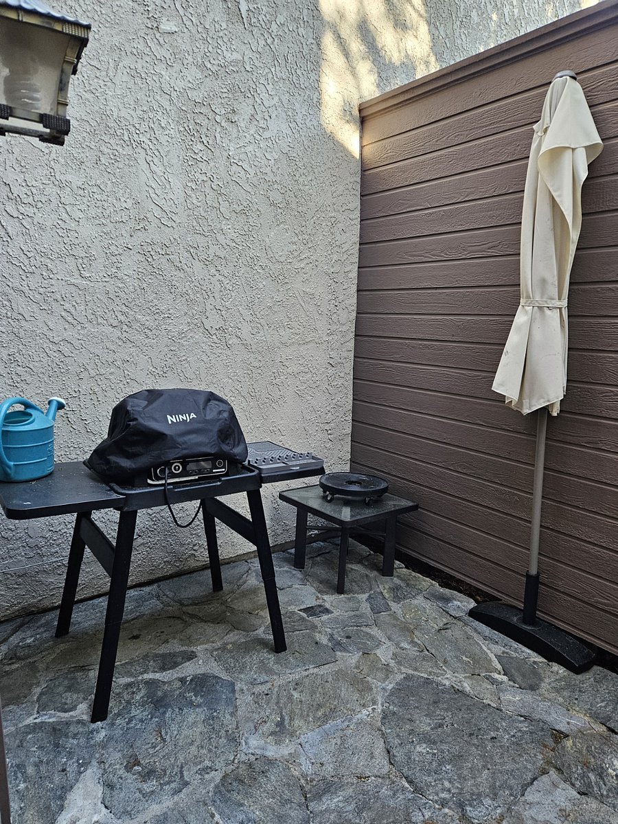 side yard patio where BBQ is