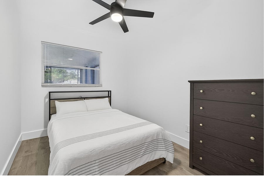 This photo has been virtually staged with bedding - please note, bedding is not provided.