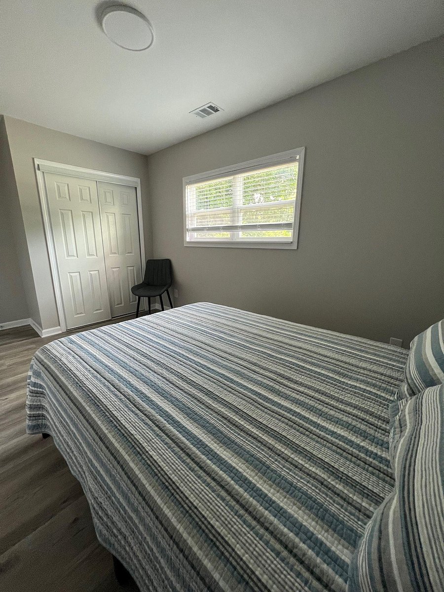 #3 - Bedroom - Includes a full size bed, closet, nightstand, small desk and chair.