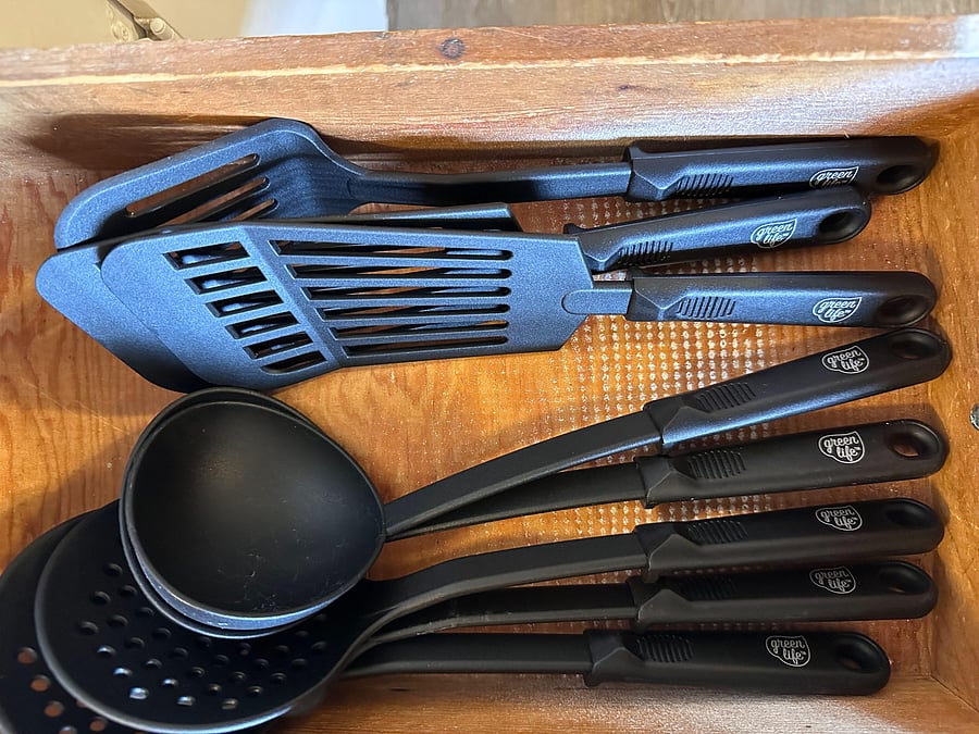 Kitchen stocked with utensils for all your cooking needs.