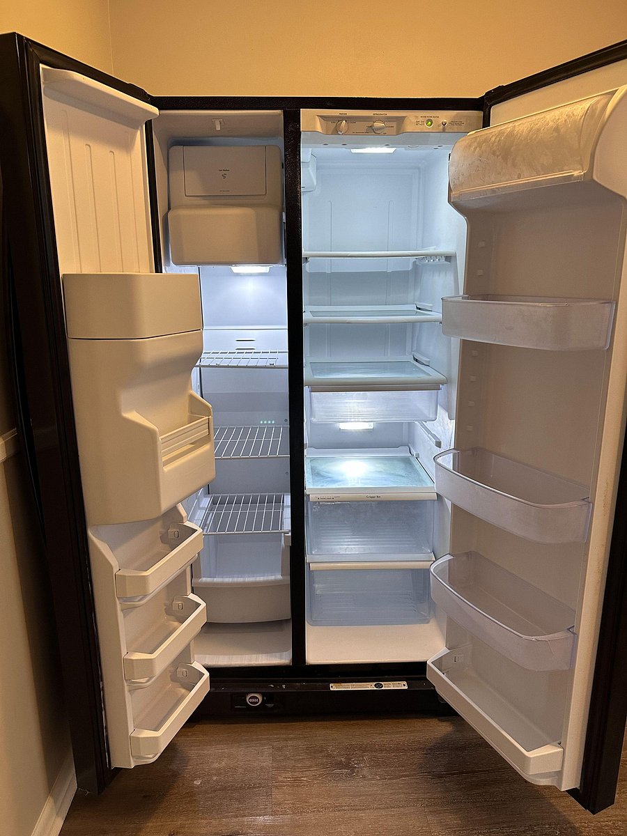 Full-size double-door refrigerator for ample food storage and convenience.