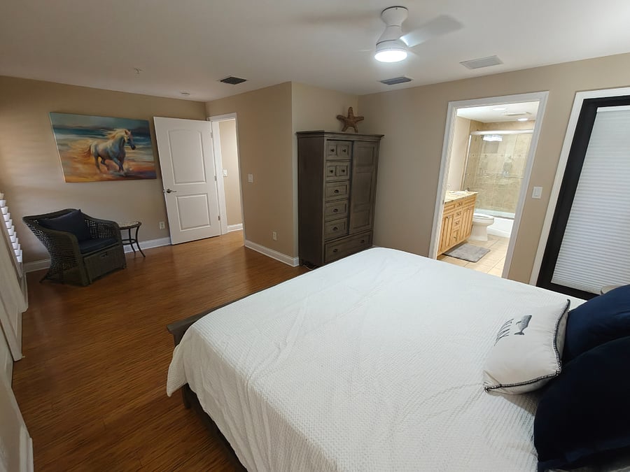 MBR (w/ adjacent bath room, and door to lanai #2)