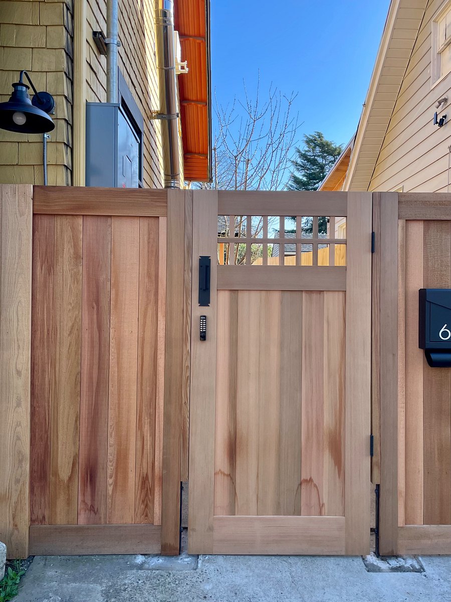 Front gate has a coded security lock and mailbox has a key for safety. There is a black storage box to the left of front gate to hold packages and food deliveries.